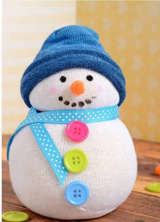 Boneco de neve feito em meia e feltro Boneco de neve feito em meia e feltro